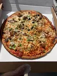The Pizza Guys Wood Fired logo