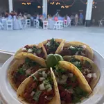 Now We Taco'N Taqueria logo
