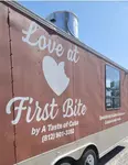 Love At First Bite By a Taste of Cuba logo