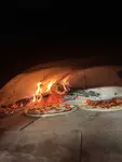 Travelin' Pizza logo