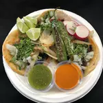Tacos el pollo y el pollito logo