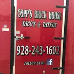 Copp's Brick House Tacos & Taters logo