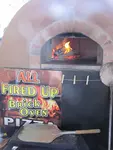 All Fired Up Brick Oven Pizza logo