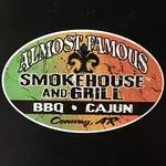 Almost Famous Smoke House & Grill logo