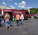Angela's Curbside Cuisine  logo