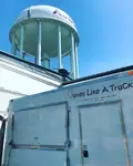 Dumps Like A Truck logo