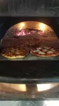 Nelly Belly Applewood Fired Pizza & Piadina Truck logo