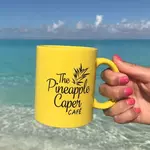 The Pineapple Caper Cafe and Catering logo