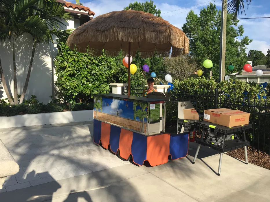 CHCIDOGGIE SERVING AT A TREASURE ISLAND GRADUATION PARTY